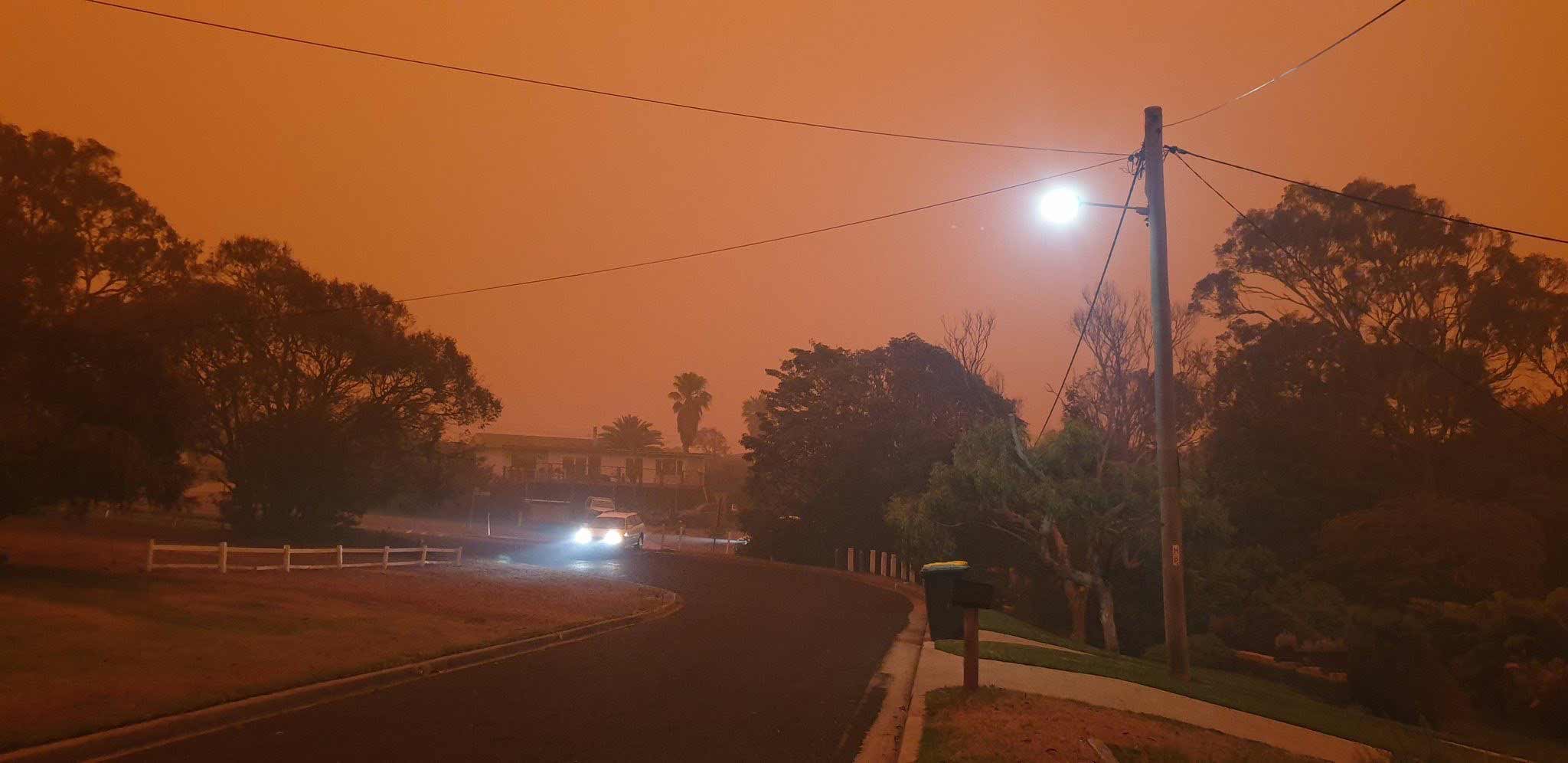 The sky turns an eerie orange in Australia as a result of the bushfires