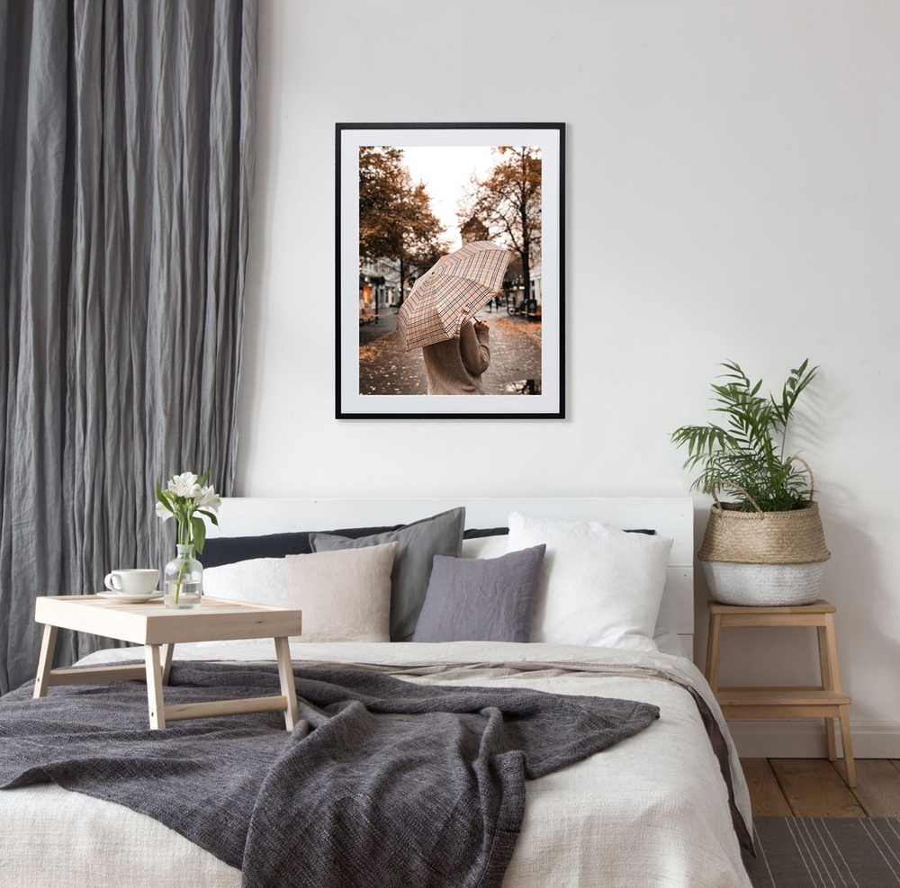 Framed print on wall in bedroom