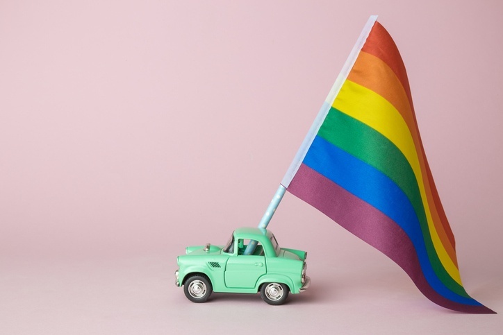 Flying the LGBTQ+ flag | What LGBTQ+ Relationships Can Teach Us About Love.jpg