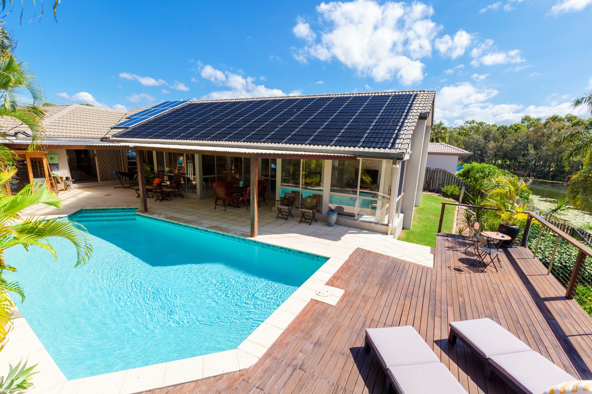 Sunny backyard with solar pool heating