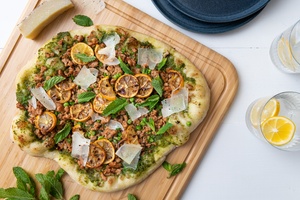 Spicy Fennel Sausage Pizza with Manchego and Pea Pesto