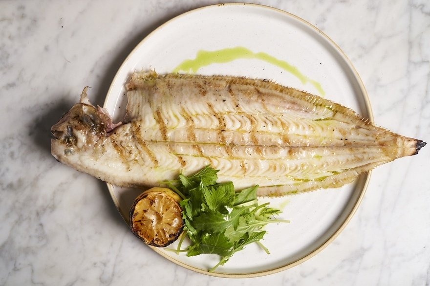 Whole Dover sole, smoked butter, confit garlic