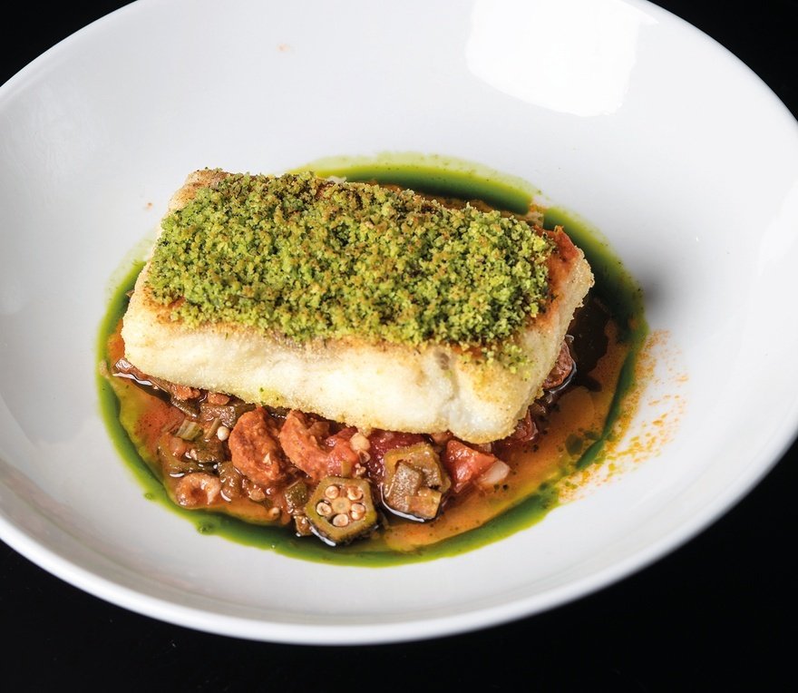 Crusted cod fillet with shrimp gumbo, chorizo, braised coco beans, sherry, tomato