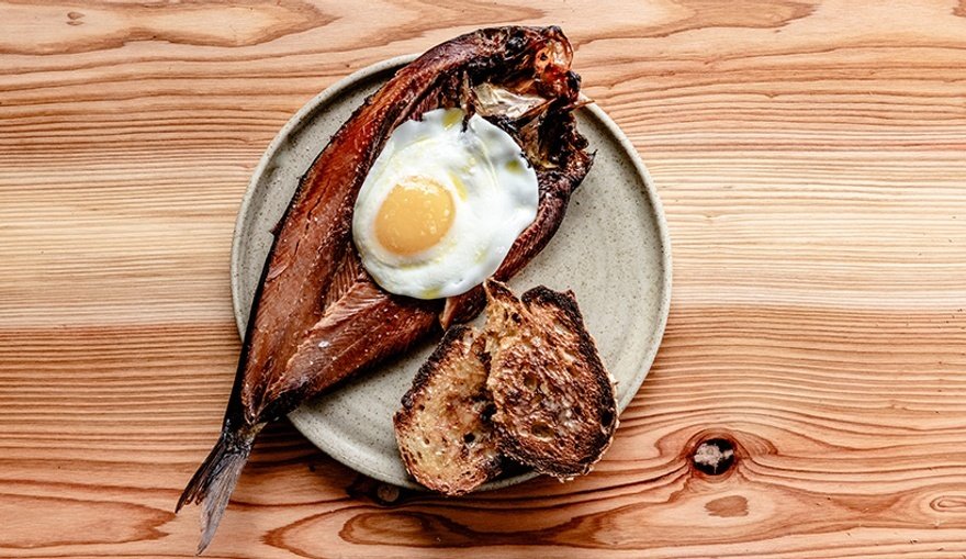 Smoked kippers, brown bread and eggs