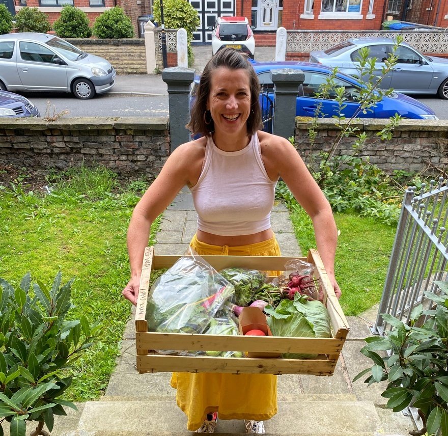 Kathleen O'Connor delivering a Marketplace veg box