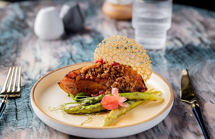 Grilled Chilean sea bass with pomegranate glaze and soya ginger crumble