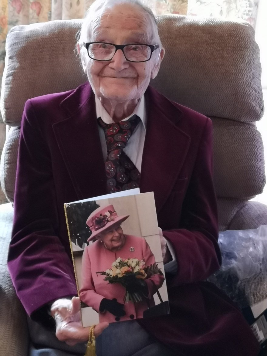 Ron Kinton celebrating his 100th birthday with a card from the Queen