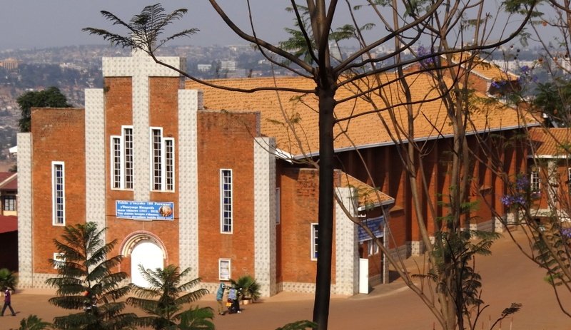 Ste.-Famille_Church_-_Genocide_Site_-_Viewed_through_Trees_-_Kigali_-_Rwanda_-_cropped.jpg